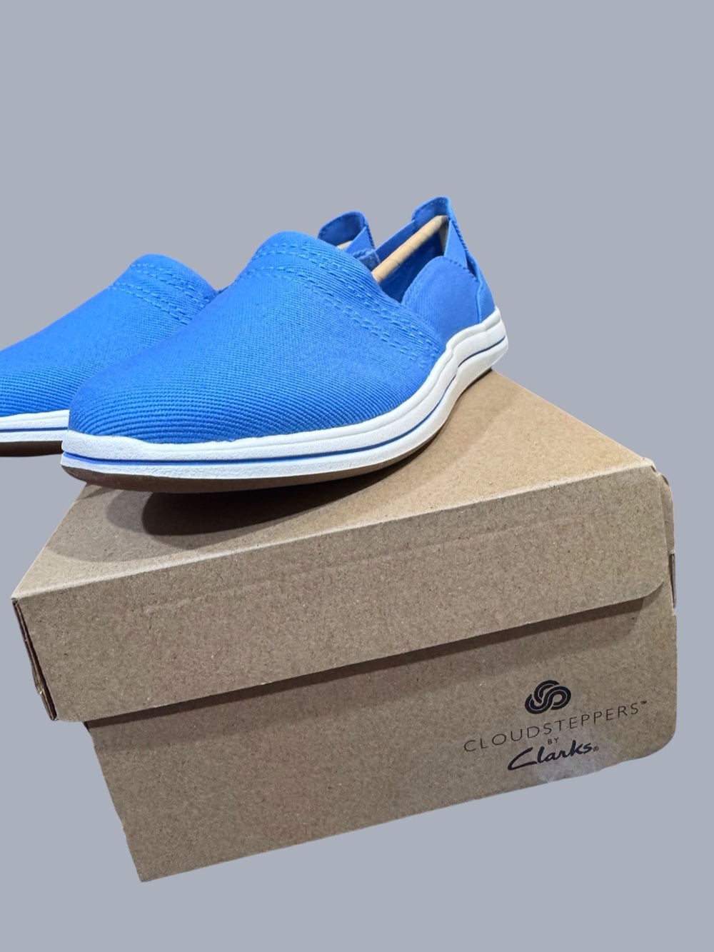 Clarks Women’s Slip-On Flat in Sky Blue with White Sole 7W